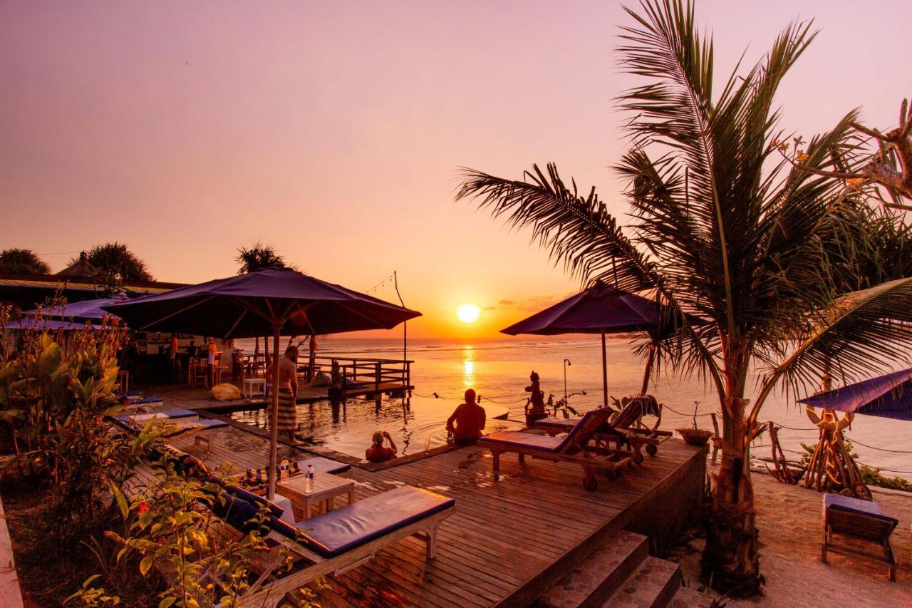 Ondergaande zon DEVINUS Bali Nusa eilanden | Personal coach en spirituele reizen DEVINUS